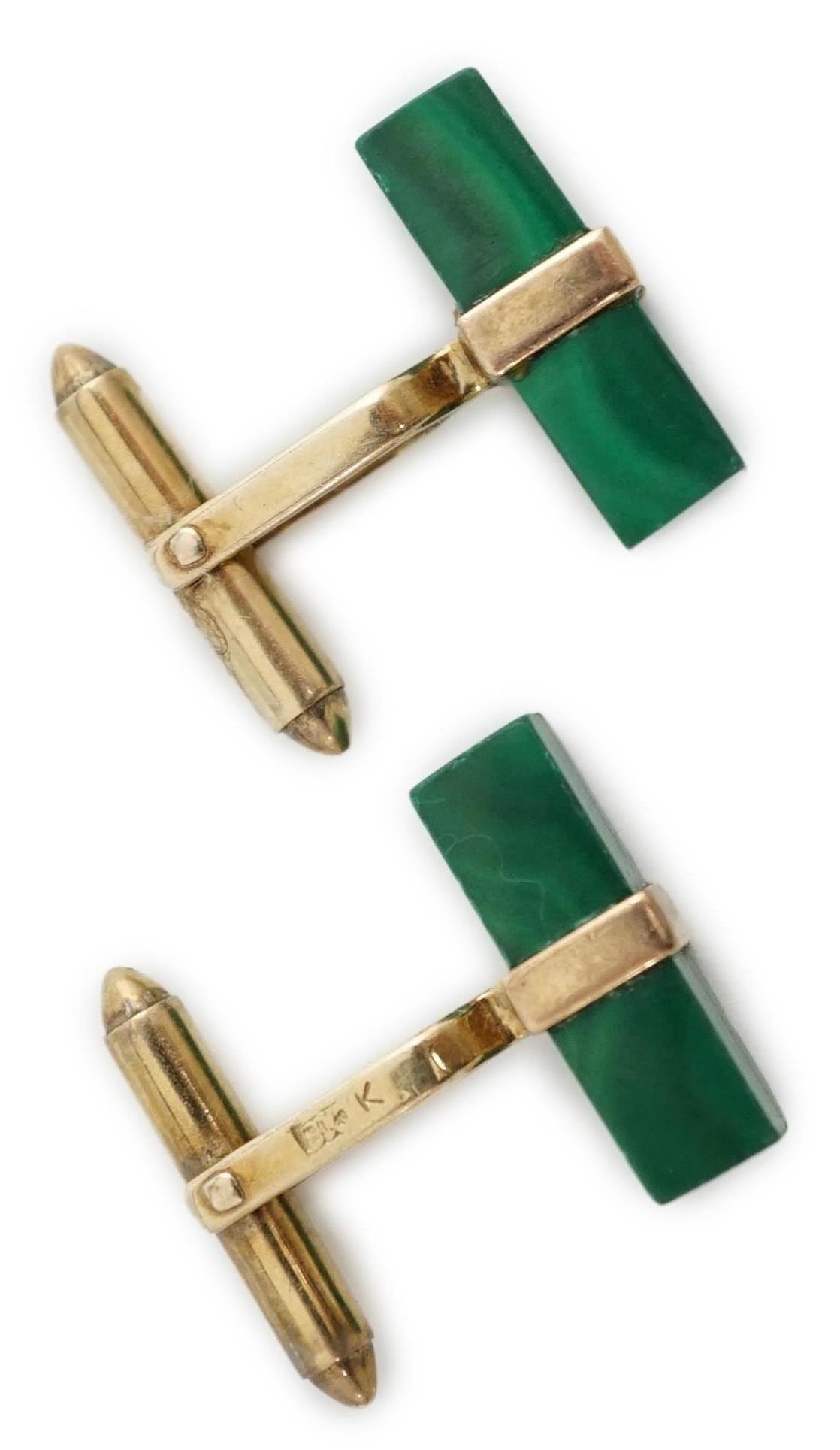 A pair of Chinese 9k gold and malachite set cufflinks